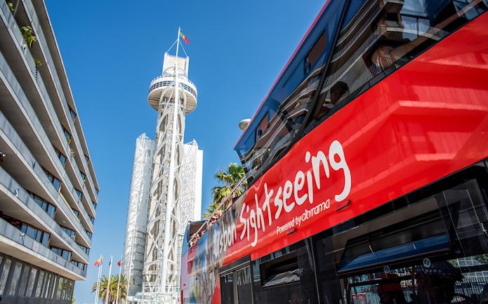 Vasco da Gama Tower with sightseeing bus in Lisbon.