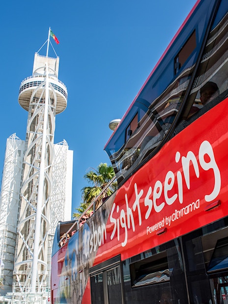 Vasco da Gama Tower with sightseeing bus in Lisbon.