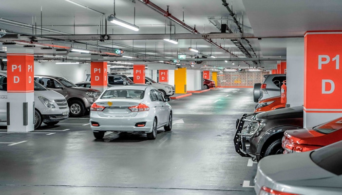 Parking facilities at a major tourist attraction with ample space and easy access.