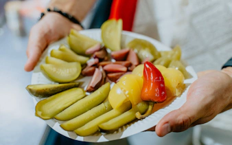 Plate of pickles and peppers served on Budapest food tour.