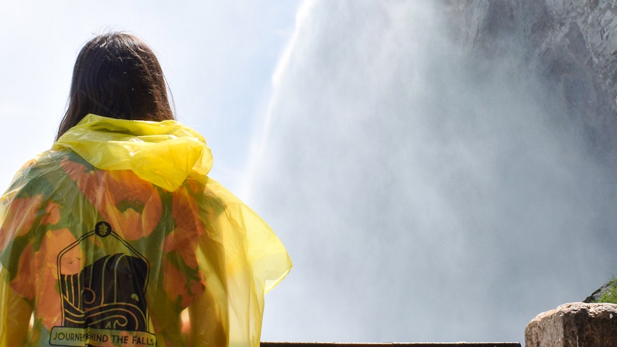 Woman looking into Niagara falls