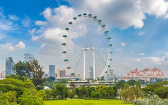 Singapore Flyer observation wheel with city skyline in the background.