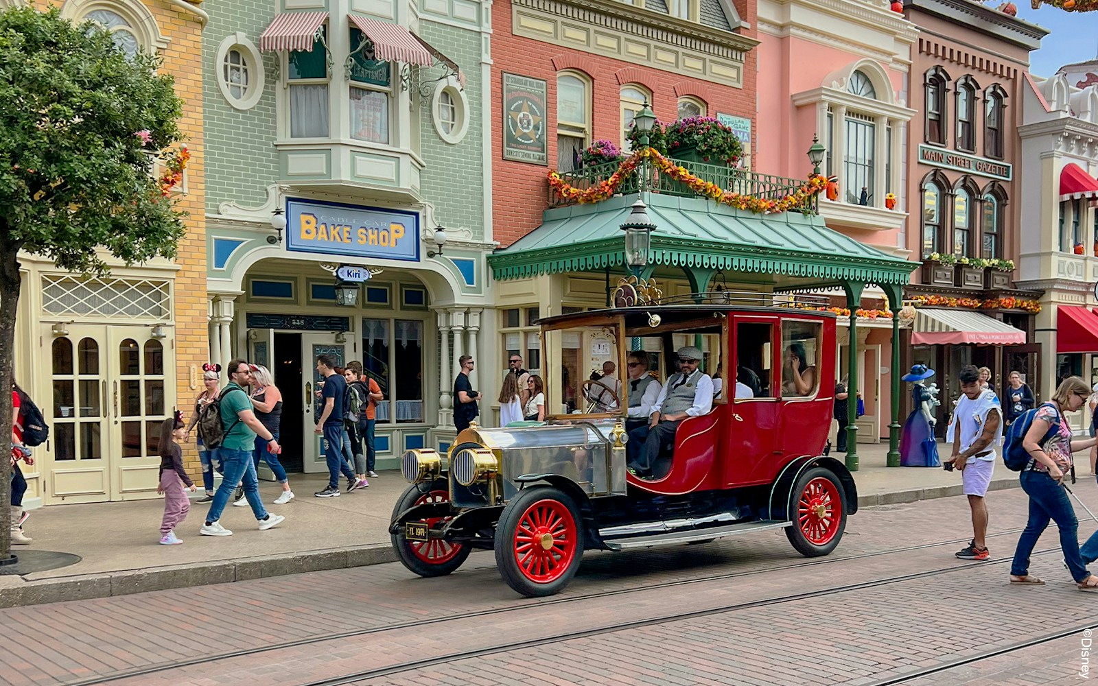 Main Street Vehicles on Main Street USA, Disneyland Paris, showcasing vintage transportation.