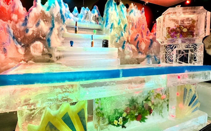 Dyed ice sculptures and colorful lights at Singapore Snow City's playground.
