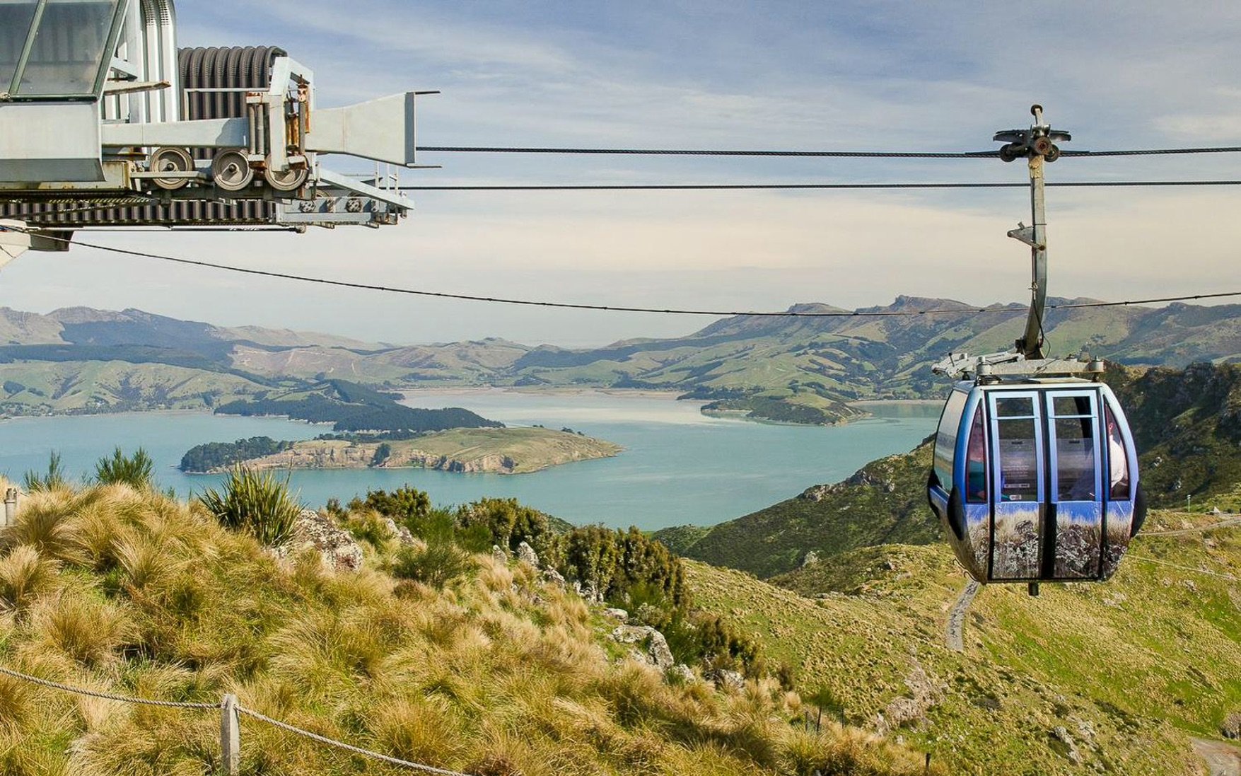 Gondola ride over hills with view of Lyttelton Harbour, Christchurch.