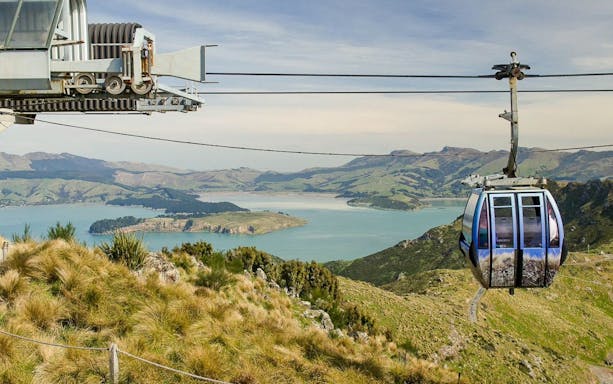 Gondola ride over hills with view of Lyttelton Harbour, Christchurch.