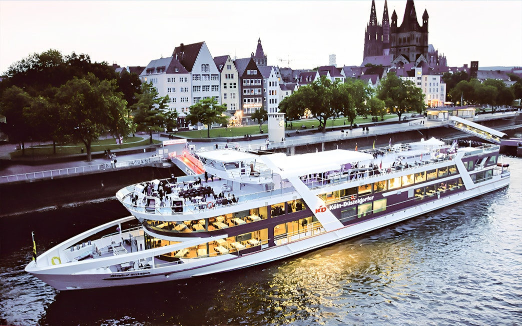 Cruise ship on the Rhine River with Cologne Cathedral in the background during a 1-hour city cruise.