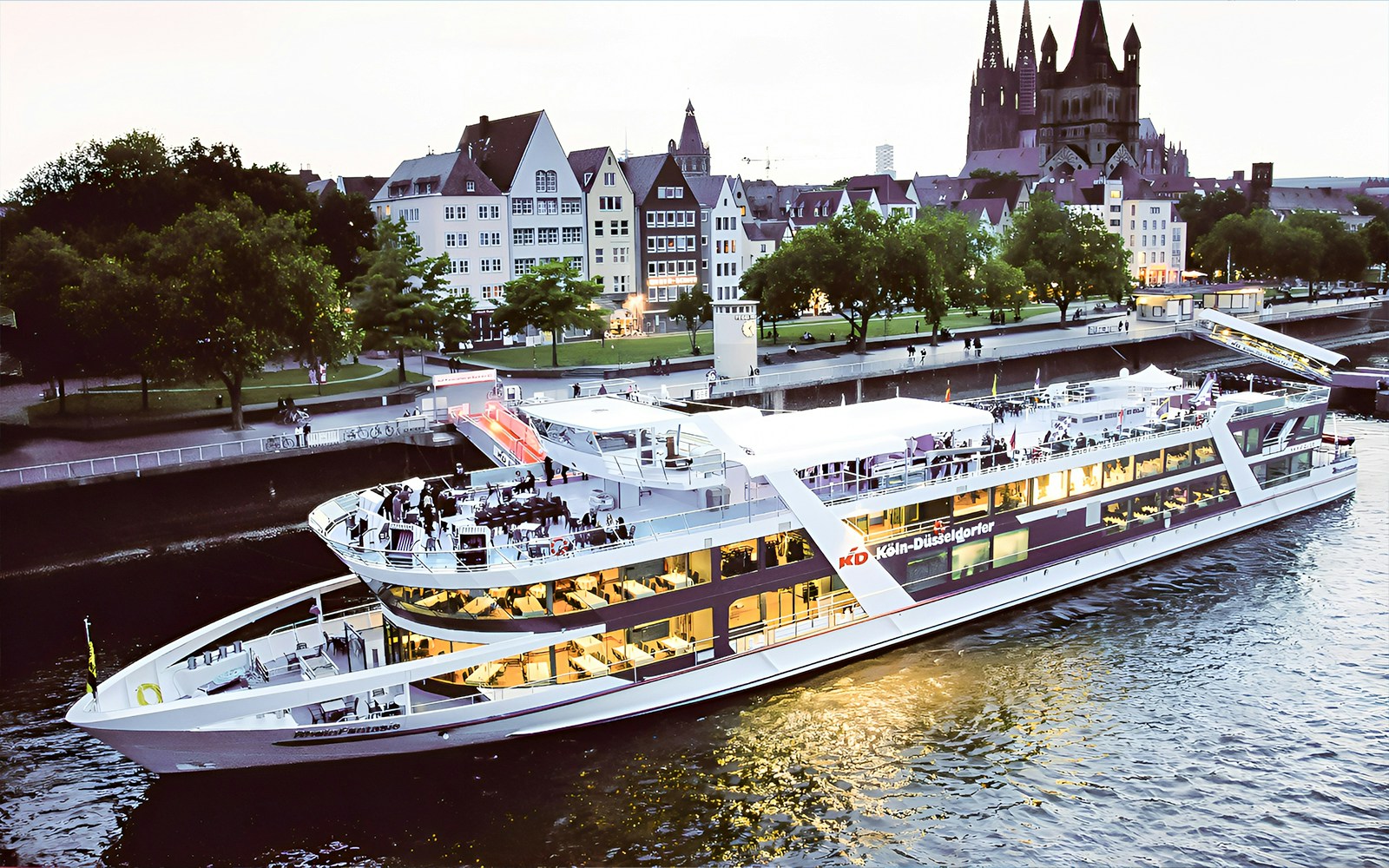 Cruise ship on the Rhine River with Cologne Cathedral in the background during a 1-hour city cruise.