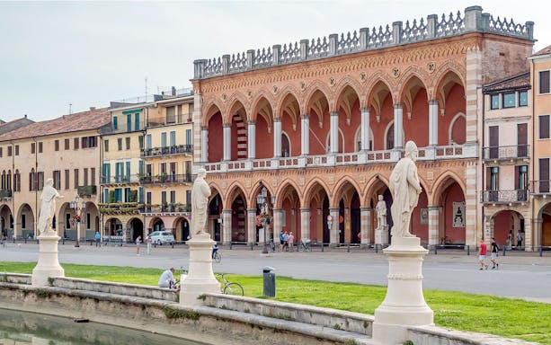 Statues and historic buildings in Prato della Valle, Padua, Italy.