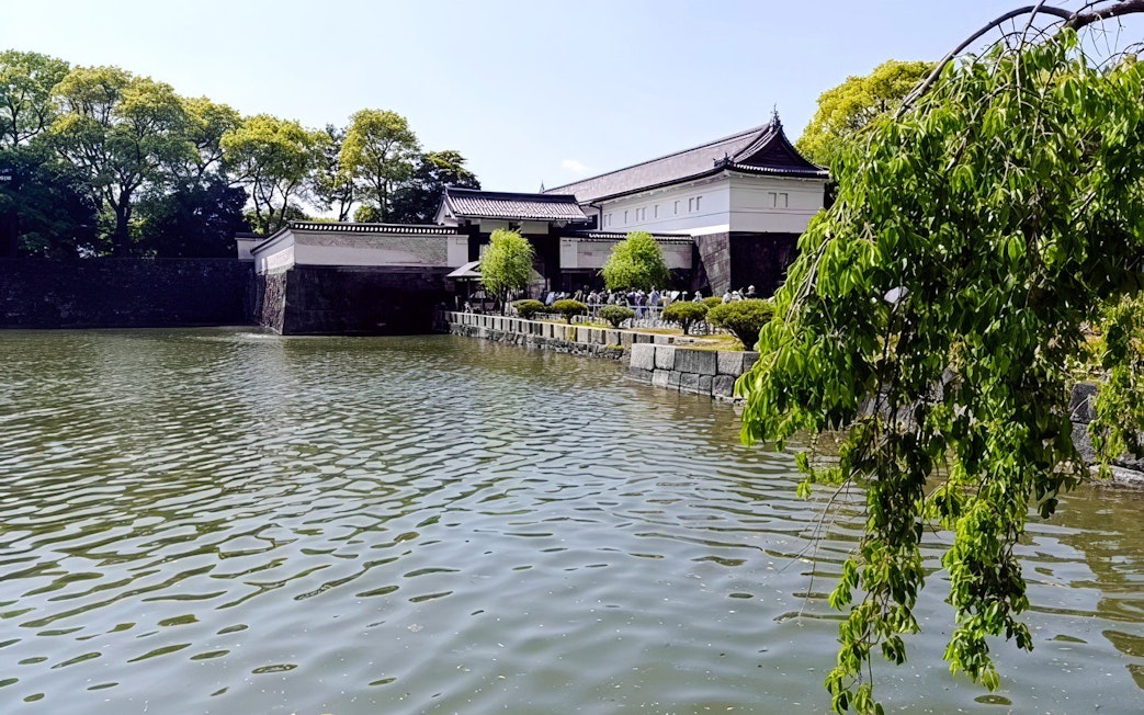 Imperial Palace moat and traditional architecture in Tokyo, Japan.