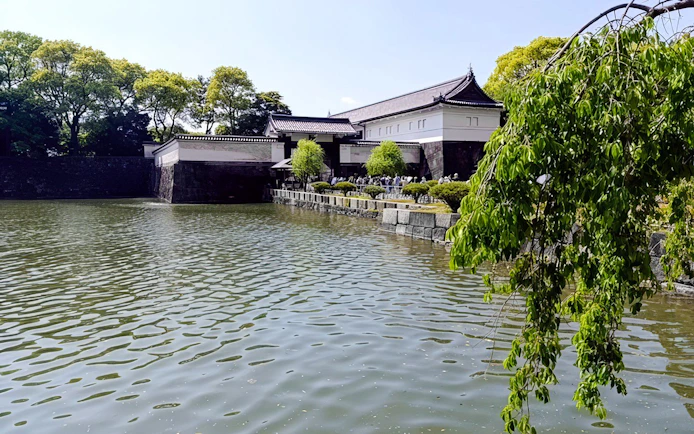 Imperial Palace moat and traditional architecture in Tokyo, Japan.