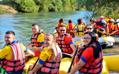 Rafting group on Bistrice River near Saranda, enjoying the adventure in inflatable boats.