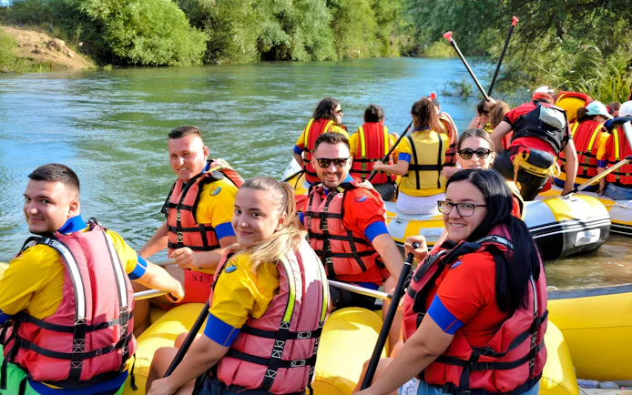 Rafting group on Bistrice River near Saranda, enjoying the adventure in inflatable boats.