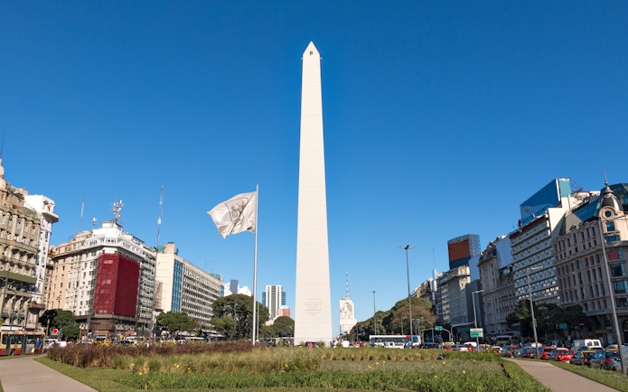 Obelisco in Buenos Aires, Argentina, surrounded by city buildings and traffic.