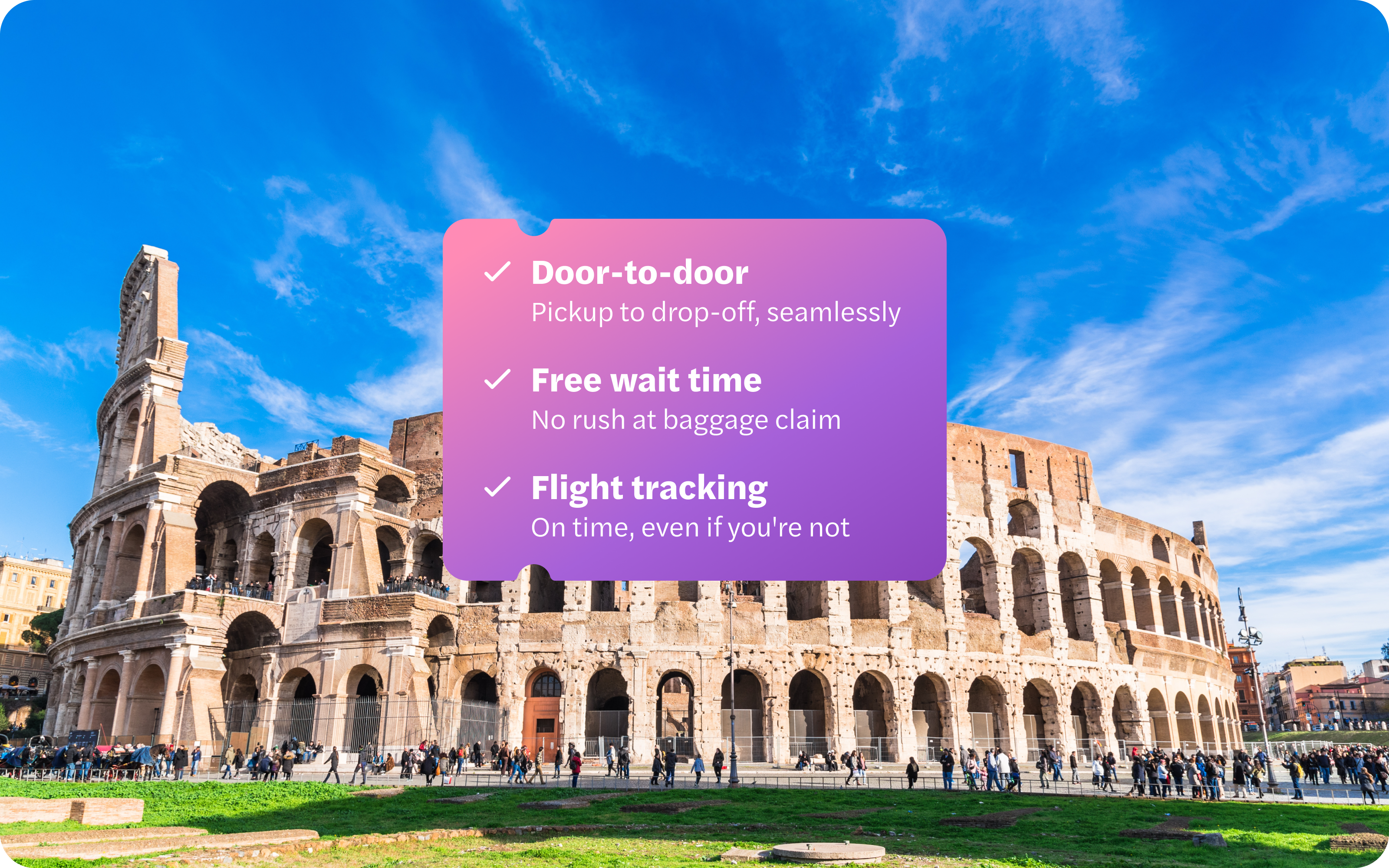 Panoramic view of the Colosseum in Rome with a clear blue sky.