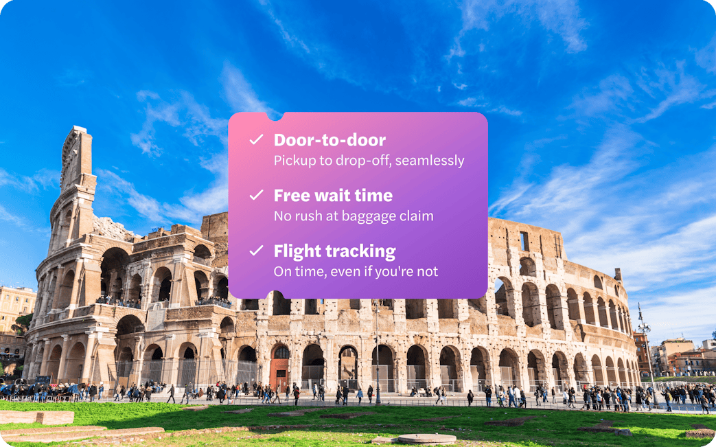 Panoramic view of the Colosseum in Rome with a clear blue sky.