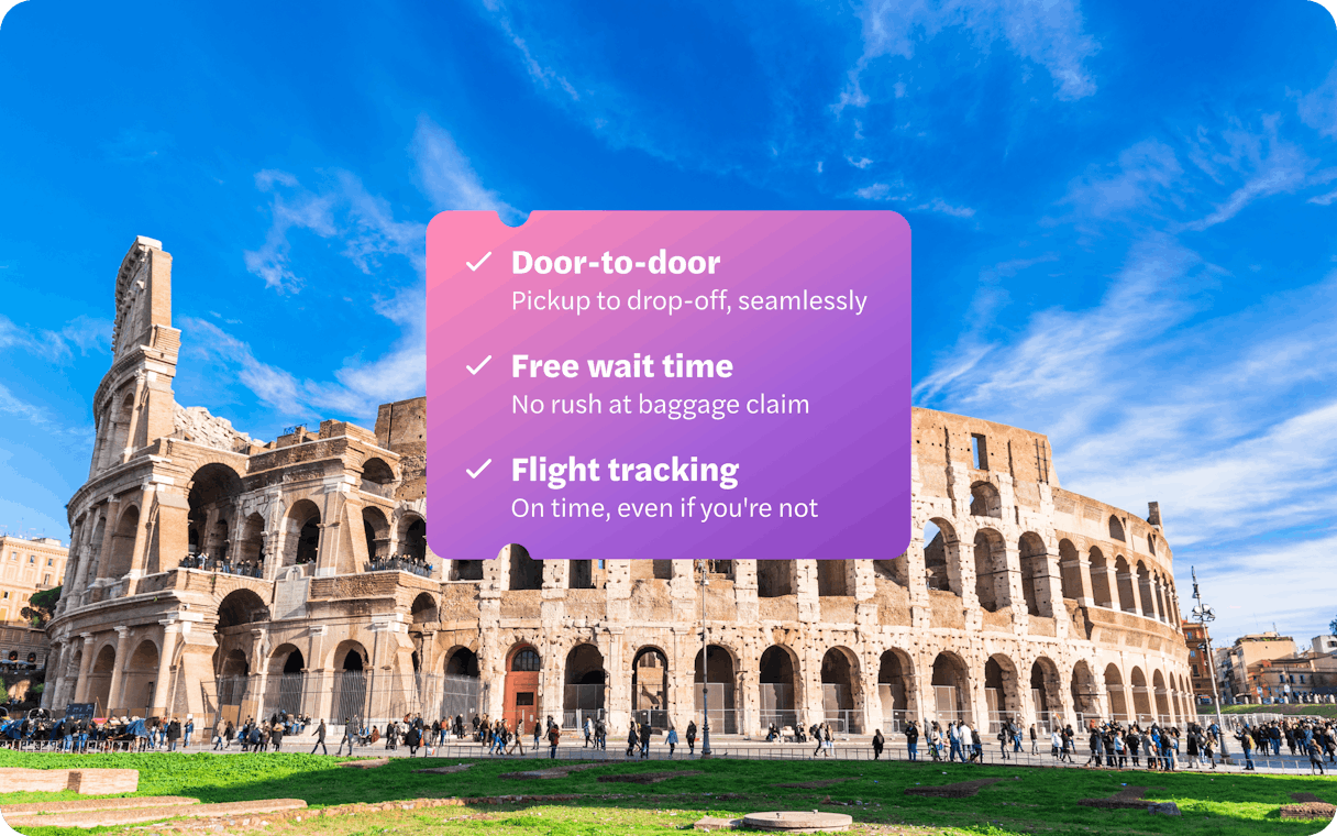 Panoramic view of the Colosseum in Rome with a clear blue sky.