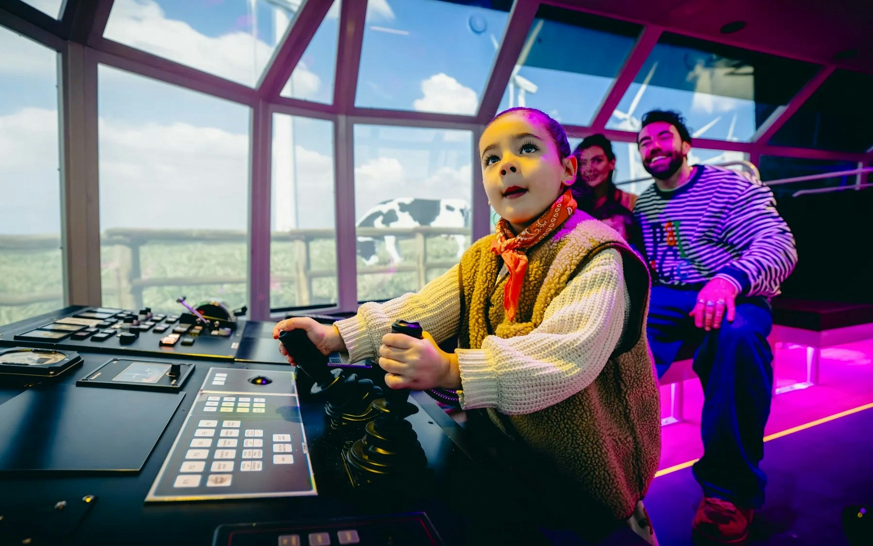 Child exploring interactive controls in Water Room at Highlights of Holland exhibit.