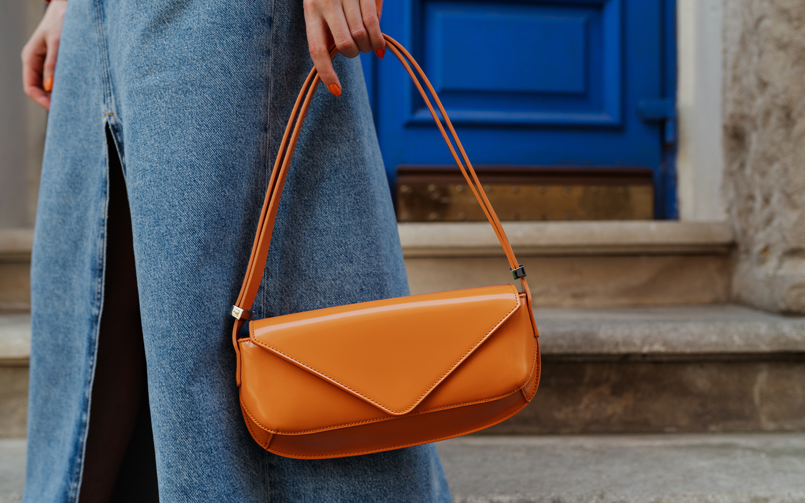 women carrying small purse