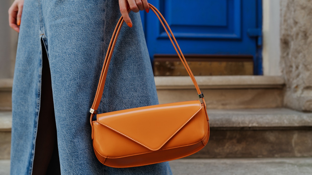 women carrying small purse