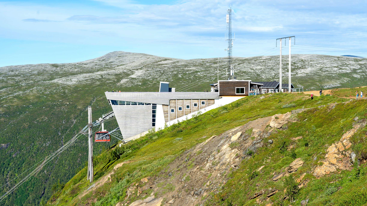 Fjellheisen Cable Car Station on Mount Storsteinen, Tromsø, Norway, with scenic mountain view.