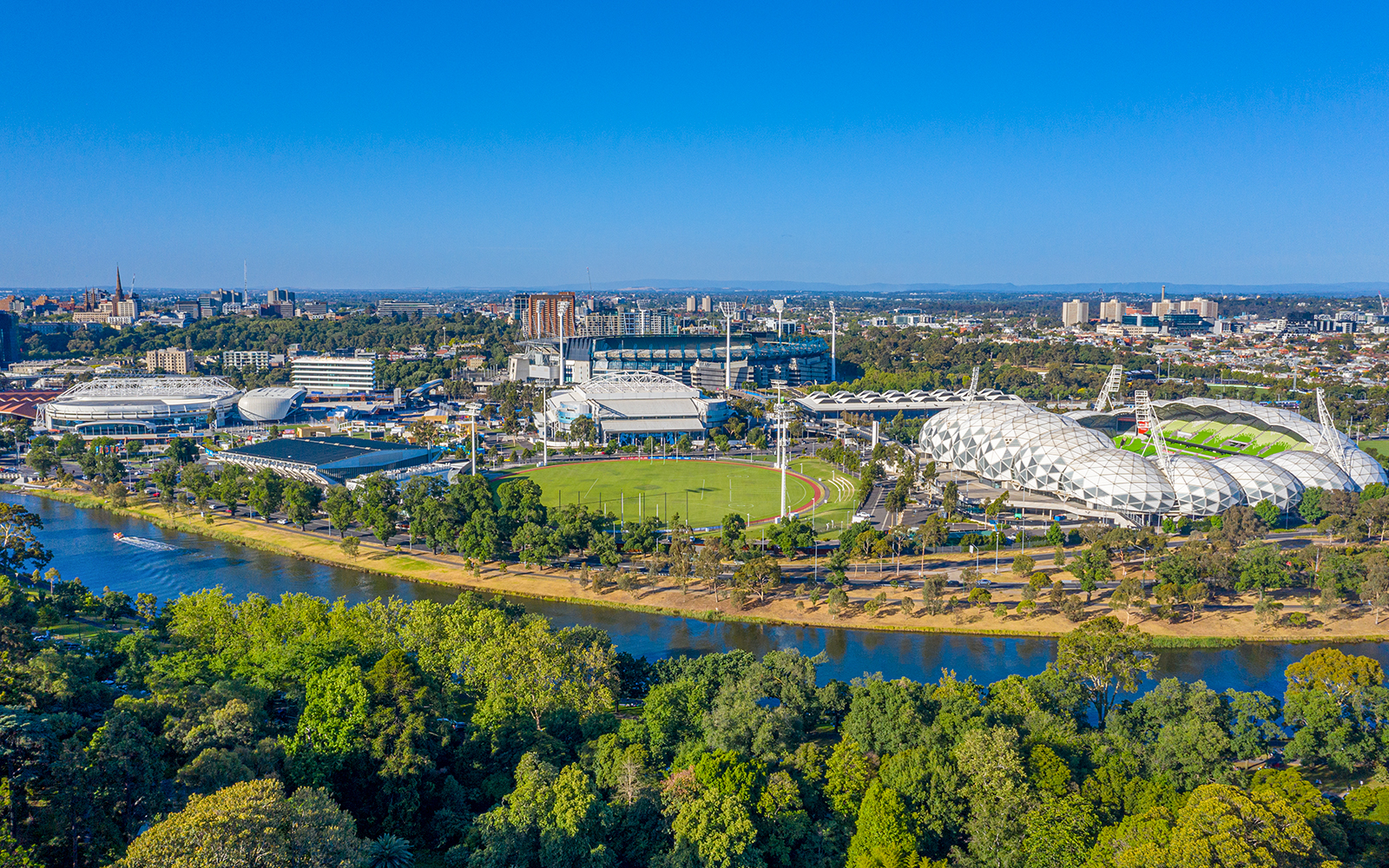 Aerial view of Melbourne sports stadiums near Yarra River, Australia.