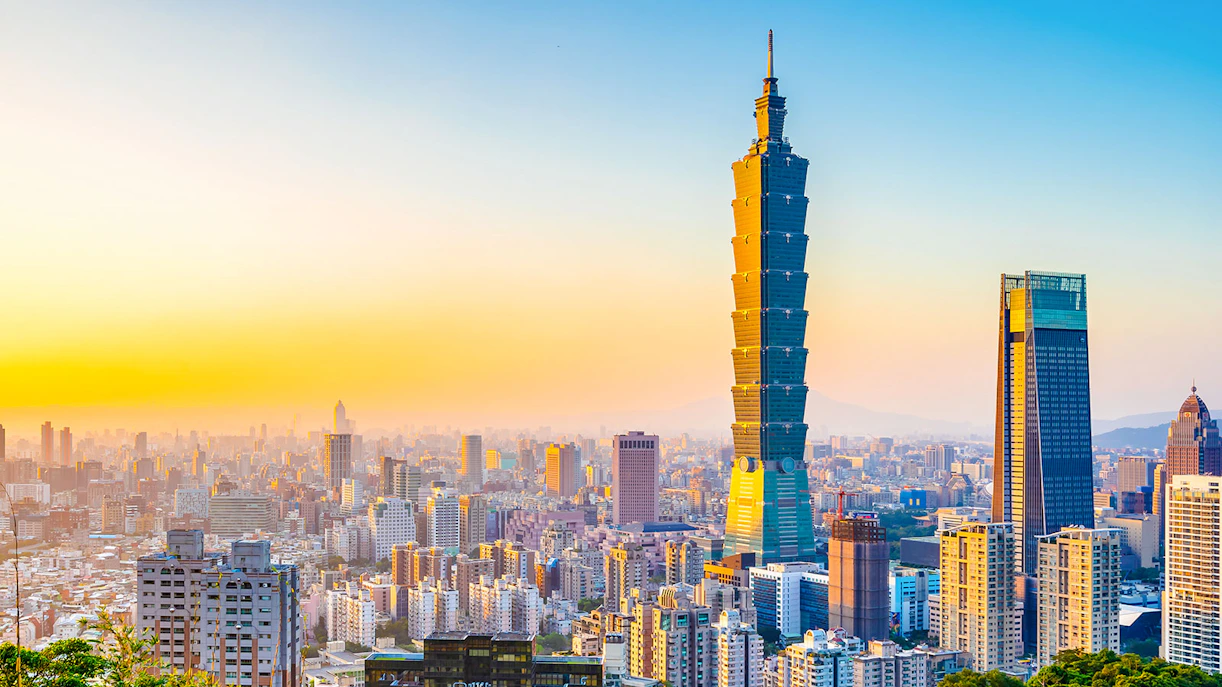 Taipei 101 skyscraper at sunset in Taipei, Taiwan skyline.