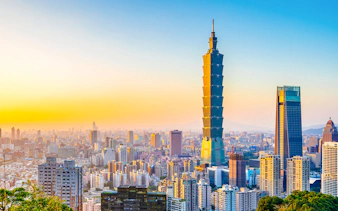 Taipei 101 skyscraper at sunset in Taipei, Taiwan skyline.