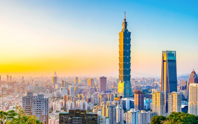 Taipei 101 skyscraper at sunset in Taipei, Taiwan skyline.