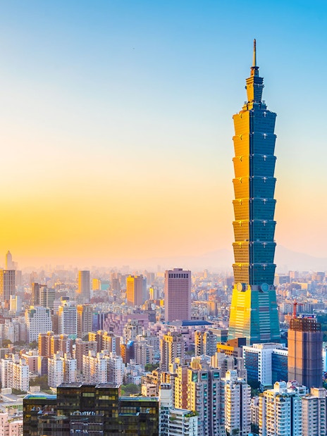 Taipei 101 skyscraper at sunset in Taipei, Taiwan skyline.