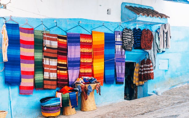 Chefchaouen blue-washed buildings and narrow streets on a day trip from Fez.