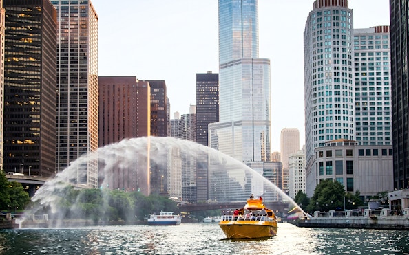 Sea Dog Cruise boat on Lake Michigan with Chicago skyline in the background.