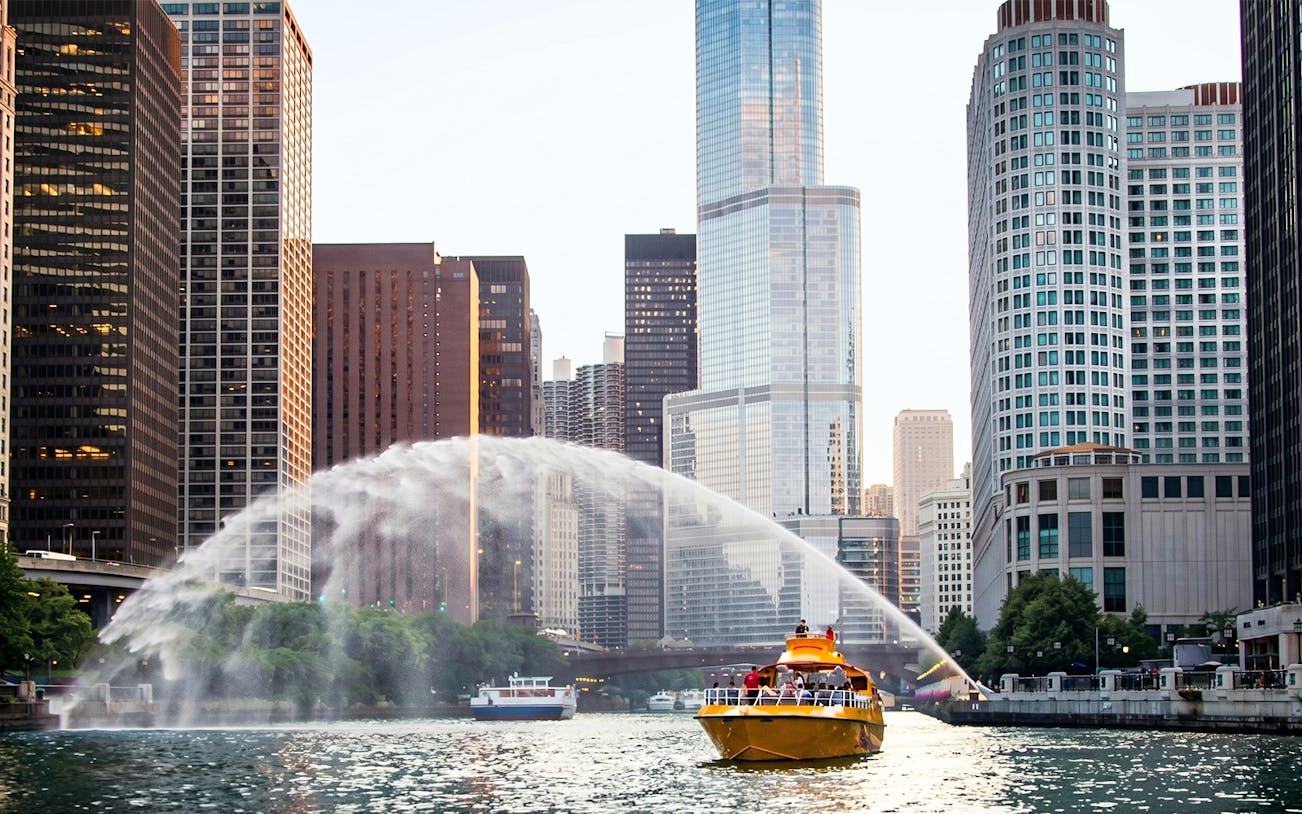 Sea Dog Cruise boat on Lake Michigan with Chicago skyline in the background.