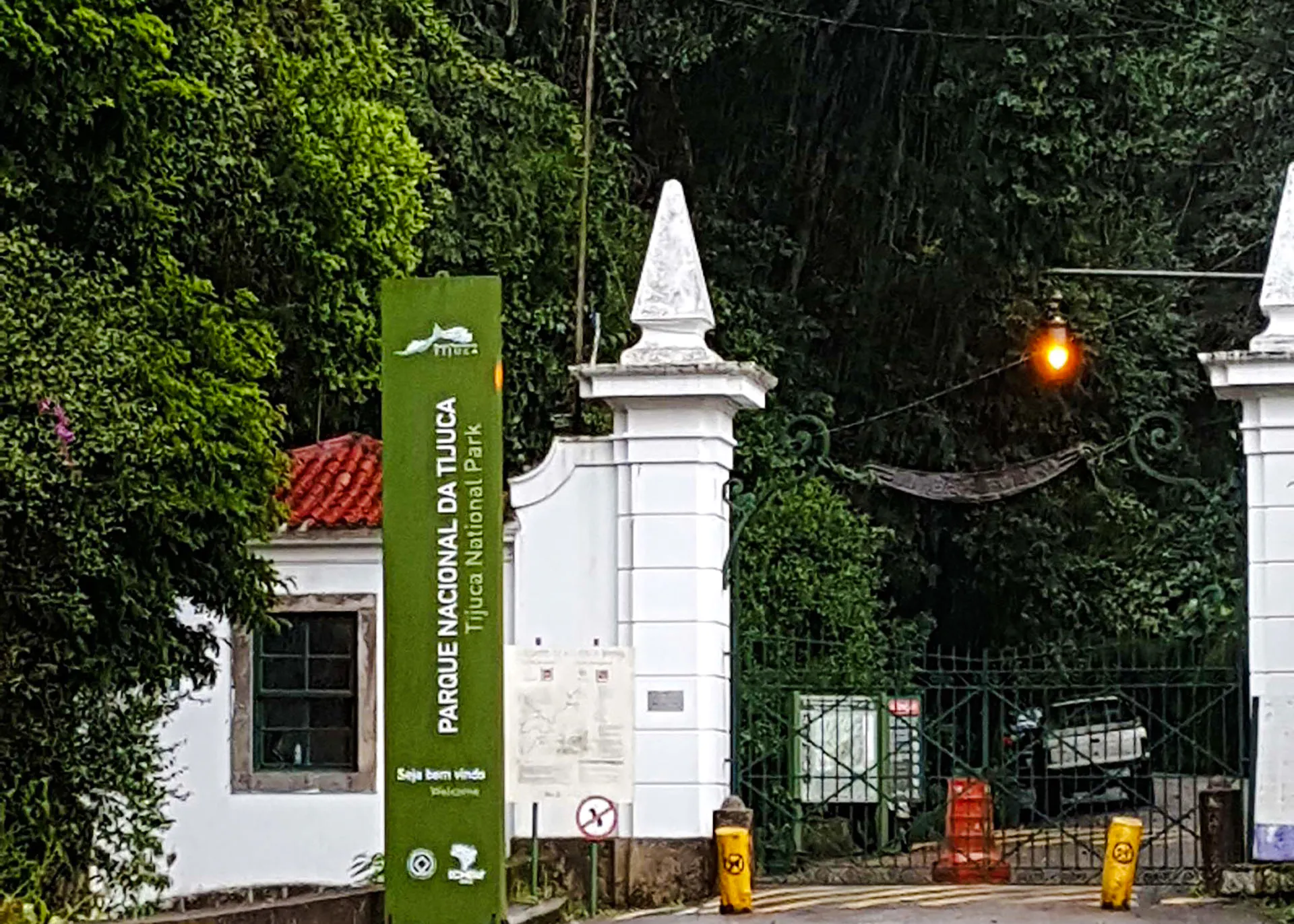 Entrance to Tijuca National Park with sign and gate, Rio de Janeiro.