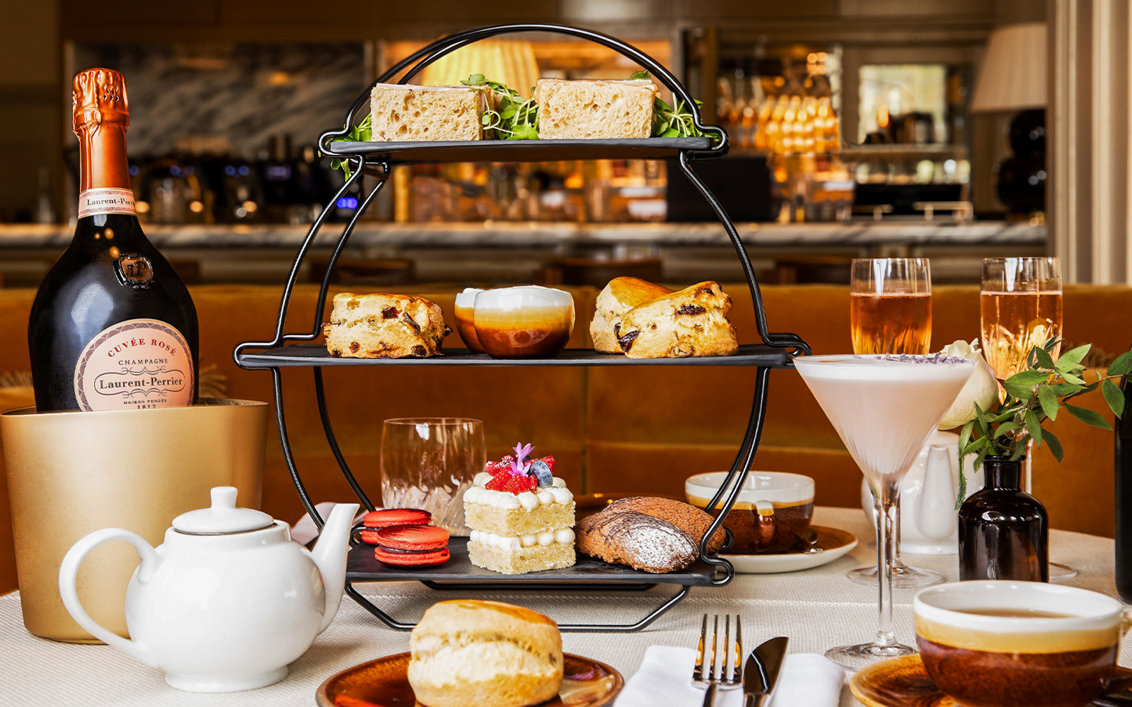 Afternoon tea set with sandwiches, scones, and pastries at the National Gallery London.