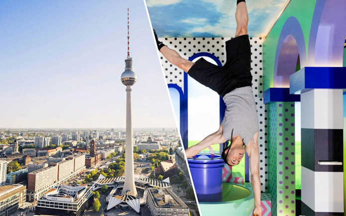 Berlin TV Tower with city view and person in Upside Down Berlin exhibit.