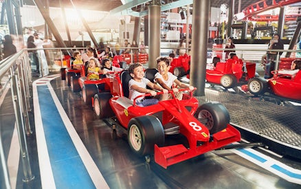 Children driving mini Ferraris at Ferrari World Abu Dhabi.