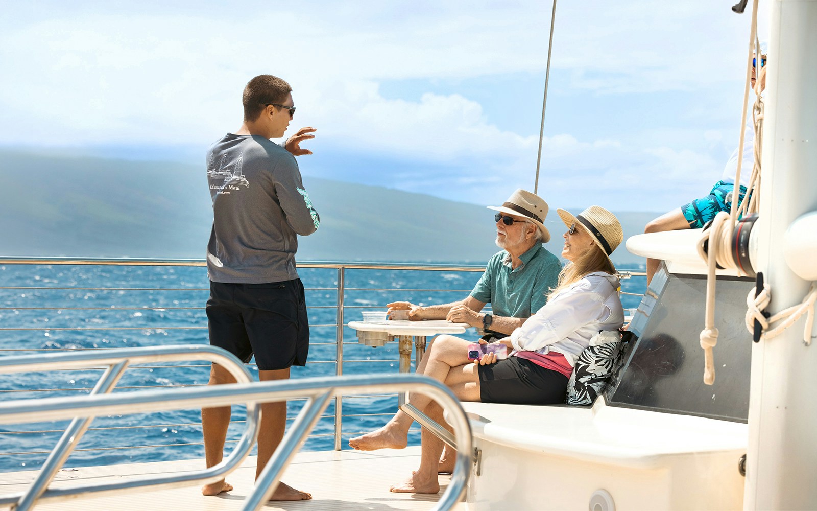 Guests enjoying a guided snorkel sail tour on a yacht in Maui, Hawaii.