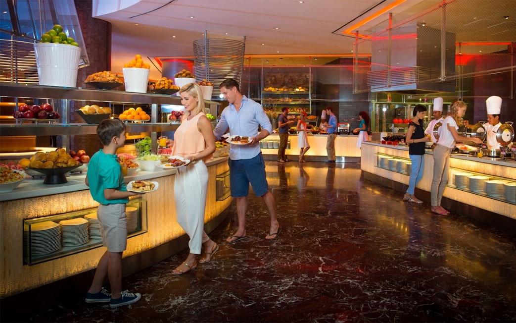 Guests selecting dishes at Saffron Dinner Buffet, Atlantis The Palm, Dubai.