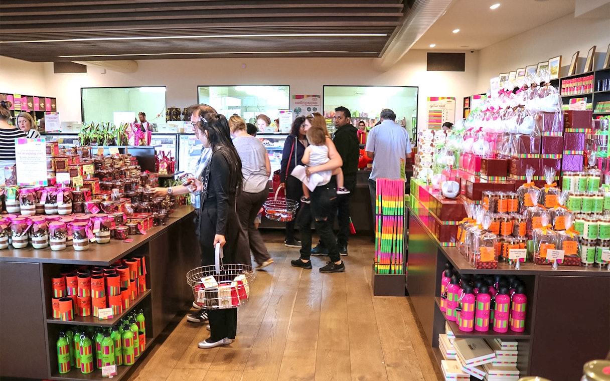 Yarra Valley shop with visitors browsing local gourmet products.
