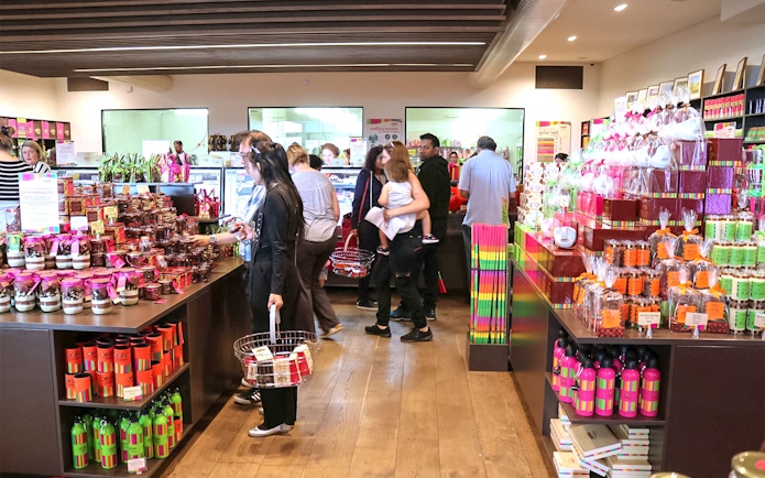 Yarra Valley shop with visitors browsing local gourmet products.