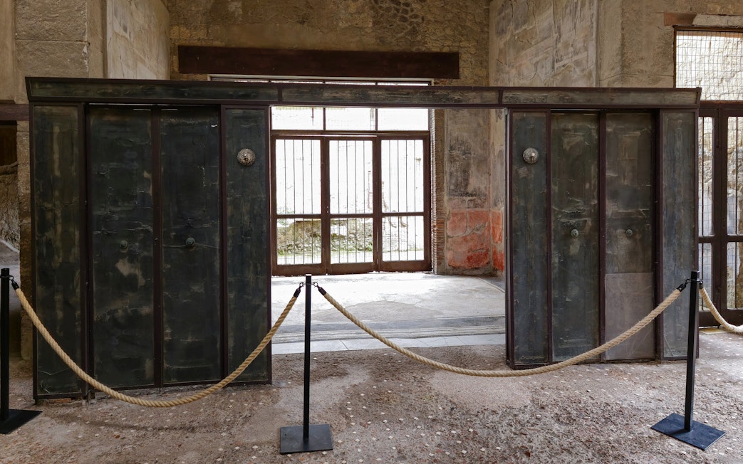 Wooden partition in Herculaneum house interior, Italy.