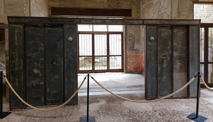 Wooden partition in Herculaneum house interior, Italy.