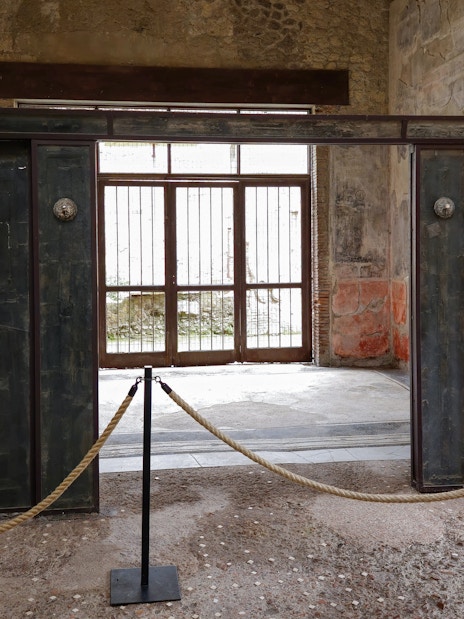 Wooden partition in Herculaneum house interior, Italy.