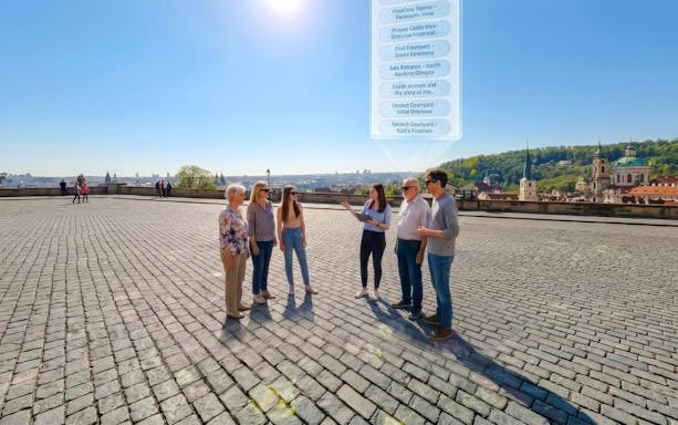 Guests using AR glasses on Prague Castle Time Travel Tour.