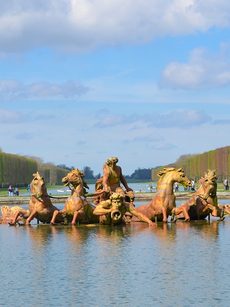 Fountain of Horses sculpture in Versailles Palace gardens, France.