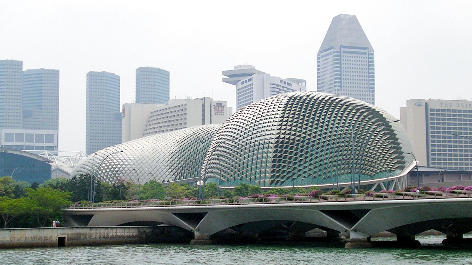 Esplanade - Theatres on the Bay with Marina Bay Sands in Singapore skyline.