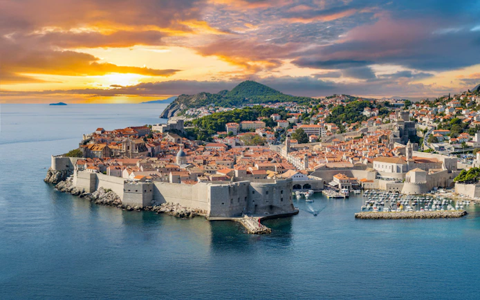 Dubrovnik Old Town and city walls at sunset, Croatia.