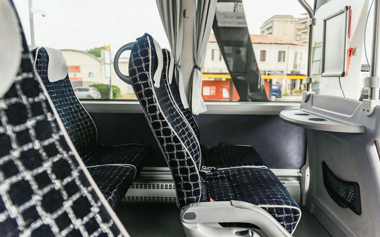Interior seating of ATVO airport transfer bus in Venice.