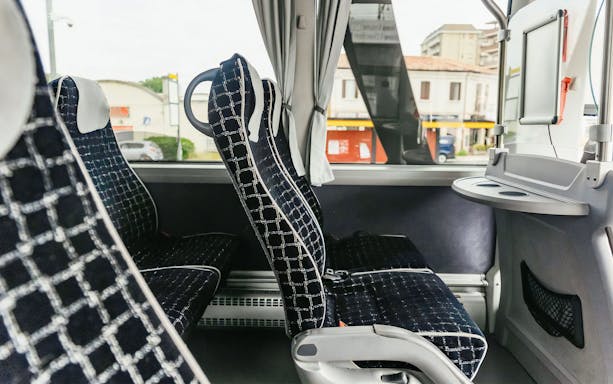 Interior seating of ATVO airport transfer bus in Venice.